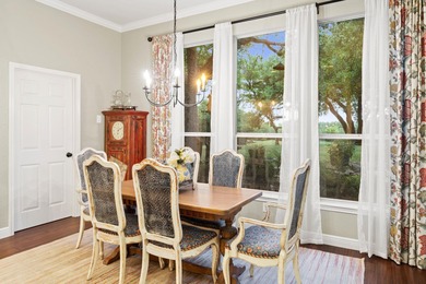 Nestled beneath a canopy of mature trees and overlooking the on Slick Rock Golf Course - Horseshoe Bay in Texas - for sale on GolfHomes.com, golf home, golf lot