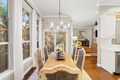 Nestled beneath a canopy of mature trees and overlooking the on Slick Rock Golf Course - Horseshoe Bay in Texas - for sale on GolfHomes.com, golf home, golf lot