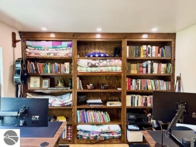 Discover 2,200 sq. ft. of luxurious, single-level living in this on Pine River Country Club in Michigan - for sale on GolfHomes.com, golf home, golf lot
