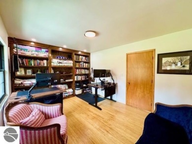Discover 2,200 sq. ft. of luxurious, single-level living in this on Pine River Country Club in Michigan - for sale on GolfHomes.com, golf home, golf lot