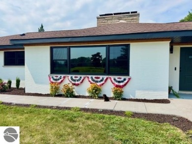 Discover 2,200 sq. ft. of luxurious, single-level living in this on Pine River Country Club in Michigan - for sale on GolfHomes.com, golf home, golf lot