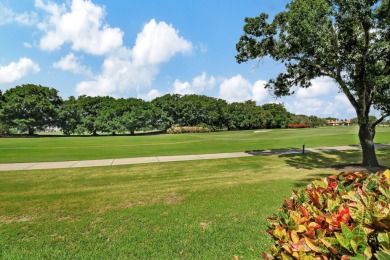 Welcome to this recently updated luxurious country club retreat on Broken Sound Golf and Club  in Florida - for sale on GolfHomes.com, golf home, golf lot