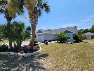 Welcome Home!! This Beach Bungalow has everything you need! on Holiday Golf Club in Florida - for sale on GolfHomes.com, golf home, golf lot