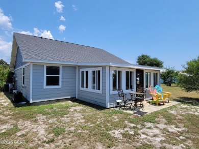 Welcome Home!! This Beach Bungalow has everything you need! on Holiday Golf Club in Florida - for sale on GolfHomes.com, golf home, golf lot