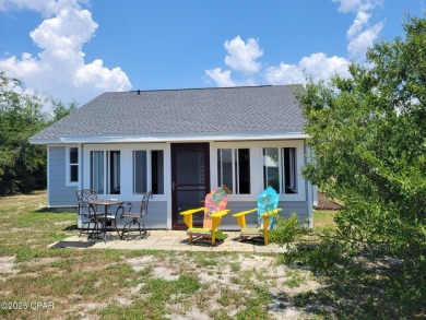 Welcome Home!! This Beach Bungalow has everything you need! on Holiday Golf Club in Florida - for sale on GolfHomes.com, golf home, golf lot