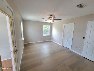 Welcome Home!! This Beach Bungalow has everything you need! on Holiday Golf Club in Florida - for sale on GolfHomes.com, golf home, golf lot