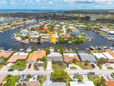 Welcome to your tropical paradise located in the sought after on Gulf Harbors Golf Course in Florida - for sale on GolfHomes.com, golf home, golf lot