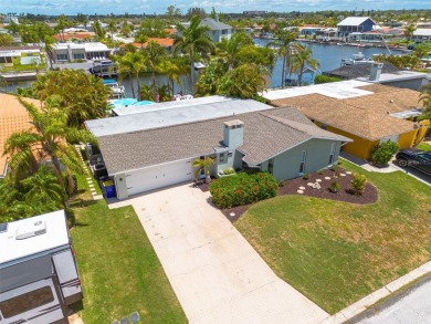 Welcome to your tropical paradise located in the sought after on Gulf Harbors Golf Course in Florida - for sale on GolfHomes.com, golf home, golf lot
