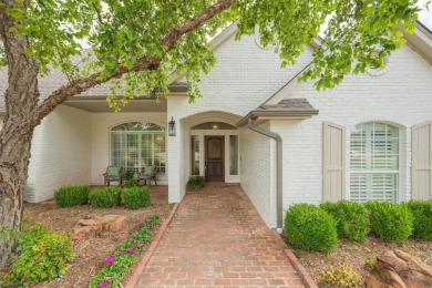 Welcome to this stunning single-story residence where modern on Oak Tree National Golf and Country Club in Oklahoma - for sale on GolfHomes.com, golf home, golf lot