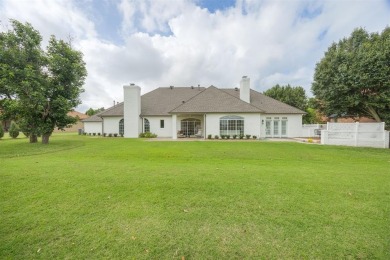 Welcome to this stunning single-story residence where modern on Oak Tree National Golf and Country Club in Oklahoma - for sale on GolfHomes.com, golf home, golf lot