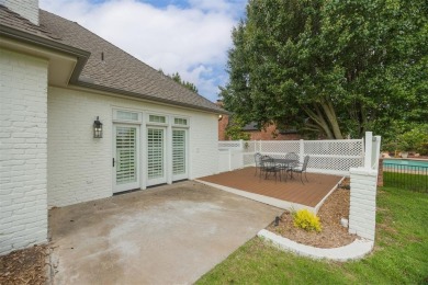 Welcome to this stunning single-story residence where modern on Oak Tree National Golf and Country Club in Oklahoma - for sale on GolfHomes.com, golf home, golf lot