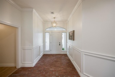 Welcome to this stunning single-story residence where modern on Oak Tree National Golf and Country Club in Oklahoma - for sale on GolfHomes.com, golf home, golf lot
