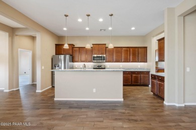 Views, views, views!! This home is nestled between the Quailwood on Quail Wood Greens Golf Course in Arizona - for sale on GolfHomes.com, golf home, golf lot