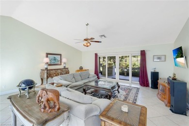 Nestled within the gated community of Spanish Wells in Bonita on Spanish Wells Golf and Country Club in Florida - for sale on GolfHomes.com, golf home, golf lot