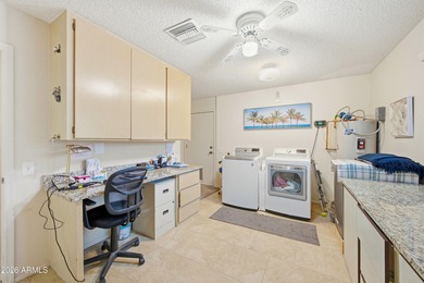 Welcome to this charming single-story home situated on a highly on Briarwood Country Club in Arizona - for sale on GolfHomes.com, golf home, golf lot