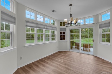 This 2 bedroom end unit ranch home is in a prime location on The Woods At Cherry Creek in New York - for sale on GolfHomes.com, golf home, golf lot