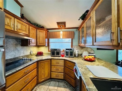 Discover serene living at Llano Grande Resort in this charming on Llano Grande Golf Course in Texas - for sale on GolfHomes.com, golf home, golf lot