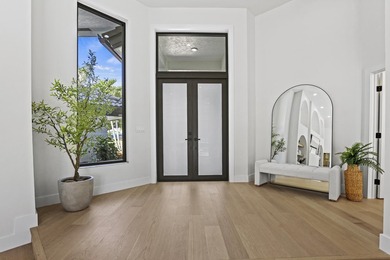 Exquisite, fully upgraded residence nestled within the on Stonebridge Golf and Country Club in Florida - for sale on GolfHomes.com, golf home, golf lot