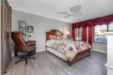 Fresh, sunny, ground-floor 2BR/2BA condo on the 6th fairway of on Miles Grant Country Club in Florida - for sale on GolfHomes.com, golf home, golf lot