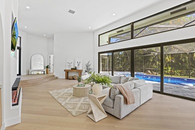 Exquisite, fully upgraded residence nestled within the on Stonebridge Golf and Country Club in Florida - for sale on GolfHomes.com, golf home, golf lot