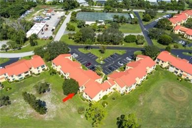 Fresh, sunny, ground-floor 2BR/2BA condo on the 6th fairway of on Miles Grant Country Club in Florida - for sale on GolfHomes.com, golf home, golf lot