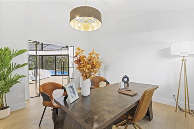 Exquisite, fully upgraded residence nestled within the on Stonebridge Golf and Country Club in Florida - for sale on GolfHomes.com, golf home, golf lot