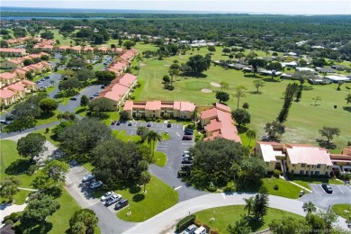 Fresh, sunny, ground-floor 2BR/2BA condo on the 6th fairway of on Miles Grant Country Club in Florida - for sale on GolfHomes.com, golf home, golf lot