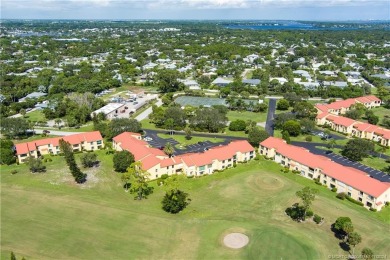 Fresh, sunny, ground-floor 2BR/2BA condo on the 6th fairway of on Miles Grant Country Club in Florida - for sale on GolfHomes.com, golf home, golf lot