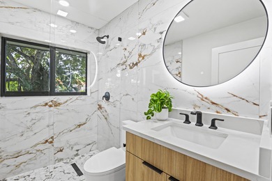 Exquisite, fully upgraded residence nestled within the on Stonebridge Golf and Country Club in Florida - for sale on GolfHomes.com, golf home, golf lot