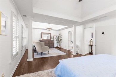 Welcome to this beautifully renovated home tucked away on a on The Golf Club of Georgia in Georgia - for sale on GolfHomes.com, golf home, golf lot