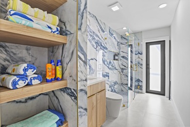 Exquisite, fully upgraded residence nestled within the on Stonebridge Golf and Country Club in Florida - for sale on GolfHomes.com, golf home, golf lot