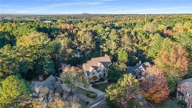 Welcome to this beautifully renovated home tucked away on a on The Golf Club of Georgia in Georgia - for sale on GolfHomes.com, golf home, golf lot