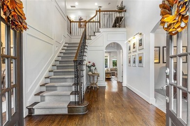 Welcome to this beautifully renovated home tucked away on a on The Golf Club of Georgia in Georgia - for sale on GolfHomes.com, golf home, golf lot