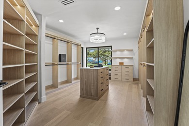 Exquisite, fully upgraded residence nestled within the on Stonebridge Golf and Country Club in Florida - for sale on GolfHomes.com, golf home, golf lot