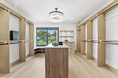 Exquisite, fully upgraded residence nestled within the on Stonebridge Golf and Country Club in Florida - for sale on GolfHomes.com, golf home, golf lot