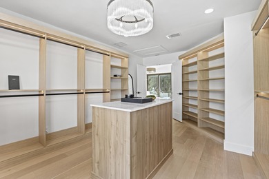 Exquisite, fully upgraded residence nestled within the on Stonebridge Golf and Country Club in Florida - for sale on GolfHomes.com, golf home, golf lot