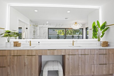 Exquisite, fully upgraded residence nestled within the on Stonebridge Golf and Country Club in Florida - for sale on GolfHomes.com, golf home, golf lot