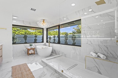 Exquisite, fully upgraded residence nestled within the on Stonebridge Golf and Country Club in Florida - for sale on GolfHomes.com, golf home, golf lot