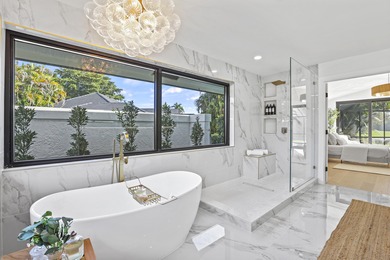 Exquisite, fully upgraded residence nestled within the on Stonebridge Golf and Country Club in Florida - for sale on GolfHomes.com, golf home, golf lot