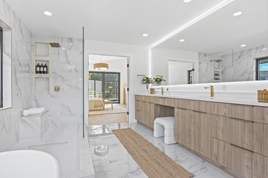 Exquisite, fully upgraded residence nestled within the on Stonebridge Golf and Country Club in Florida - for sale on GolfHomes.com, golf home, golf lot