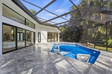 Exquisite, fully upgraded residence nestled within the on Stonebridge Golf and Country Club in Florida - for sale on GolfHomes.com, golf home, golf lot