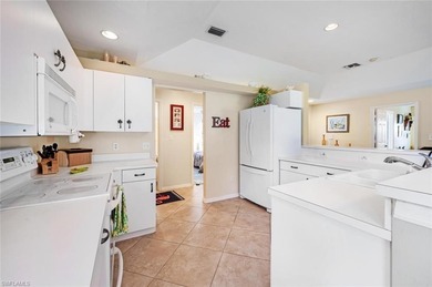This well-maintained 2BR+DEN/2BA home is located in Riviera Golf on Riviera Golf Club in Florida - for sale on GolfHomes.com, golf home, golf lot