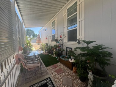 This 2021 model year "pre-owned" home that is on Hemet West Mobile Estates in California - for sale on GolfHomes.com, golf home, golf lot