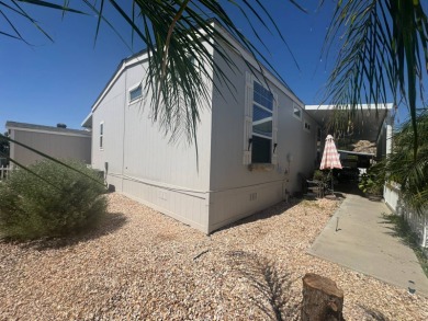 This 2021 model year "pre-owned" home that is on Hemet West Mobile Estates in California - for sale on GolfHomes.com, golf home, golf lot