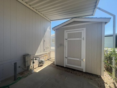 This 2021 model year "pre-owned" home that is on Hemet West Mobile Estates in California - for sale on GolfHomes.com, golf home, golf lot