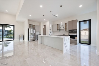 Brand new construction with nearly 2,800 sq. ft. of thoughtfully on Burnt Store Golf Club in Florida - for sale on GolfHomes.com, golf home, golf lot