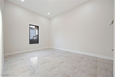 Brand new construction with nearly 2,800 sq. ft. of thoughtfully on Burnt Store Golf Club in Florida - for sale on GolfHomes.com, golf home, golf lot