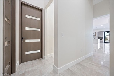 Brand new construction with nearly 2,800 sq. ft. of thoughtfully on Burnt Store Golf Club in Florida - for sale on GolfHomes.com, golf home, golf lot