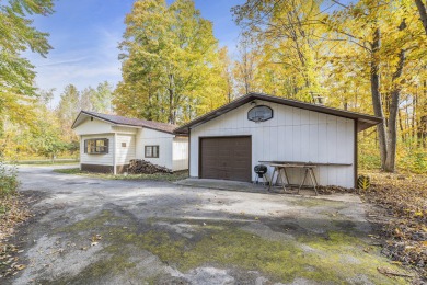 Remodeled in 2024, this 3-bedroom, 1-bath home in Lakes of the on Lakes of the North Deer Run Golf Course in Michigan - for sale on GolfHomes.com, golf home, golf lot