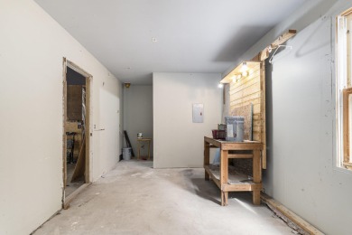 Remodeled in 2024, this 3-bedroom, 1-bath home in Lakes of the on Lakes of the North Deer Run Golf Course in Michigan - for sale on GolfHomes.com, golf home, golf lot